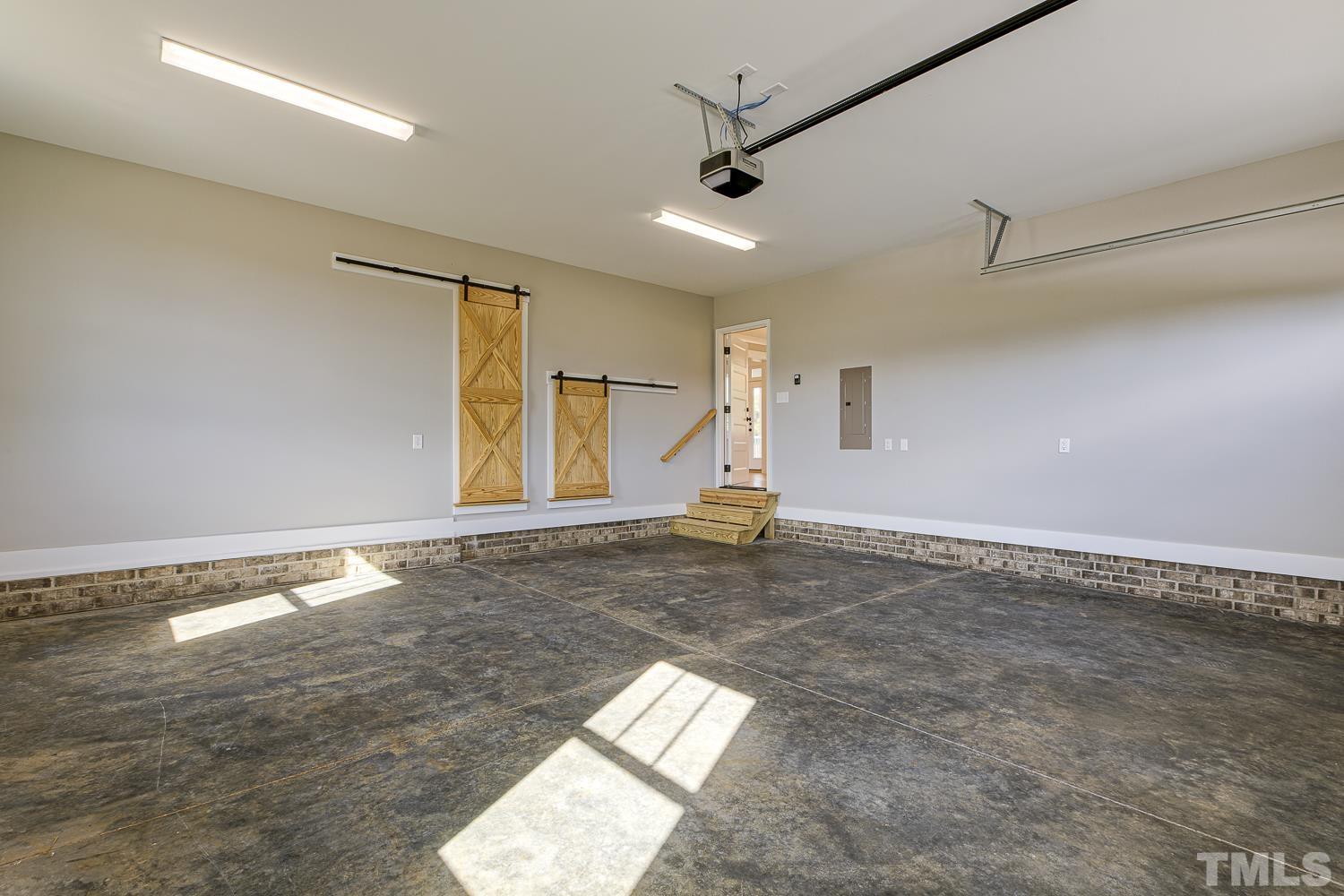742 River Road Fuquay-Varina, NC 27526 - Photo 64 of 68 a view of empty room with wooden floor and fan