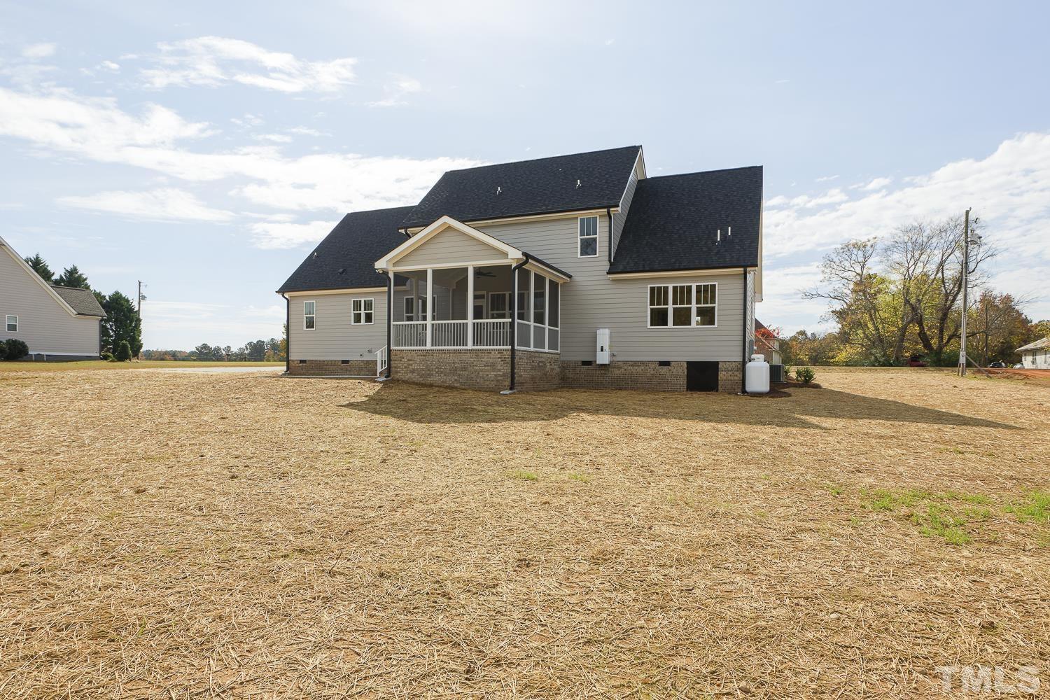 742 River Road Fuquay-Varina, NC 27526 - Photo 68 of 68 a view of a house with a yard