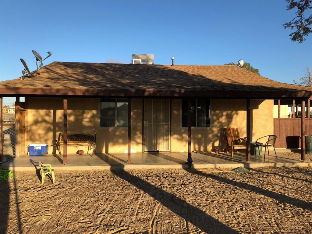 10667 Godwin Road Lucerne Valley, CA 92356 - Photo 1 of 1 a view of a house with patio