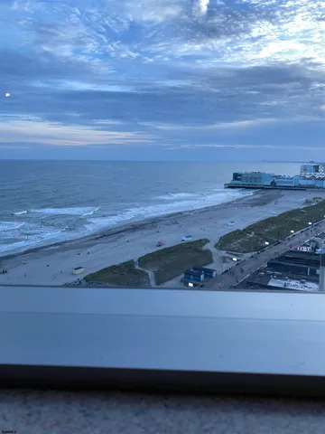 a view of beach and an ocean