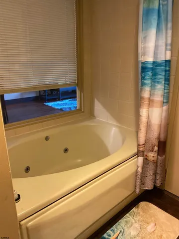 a bathroom with a bathtub