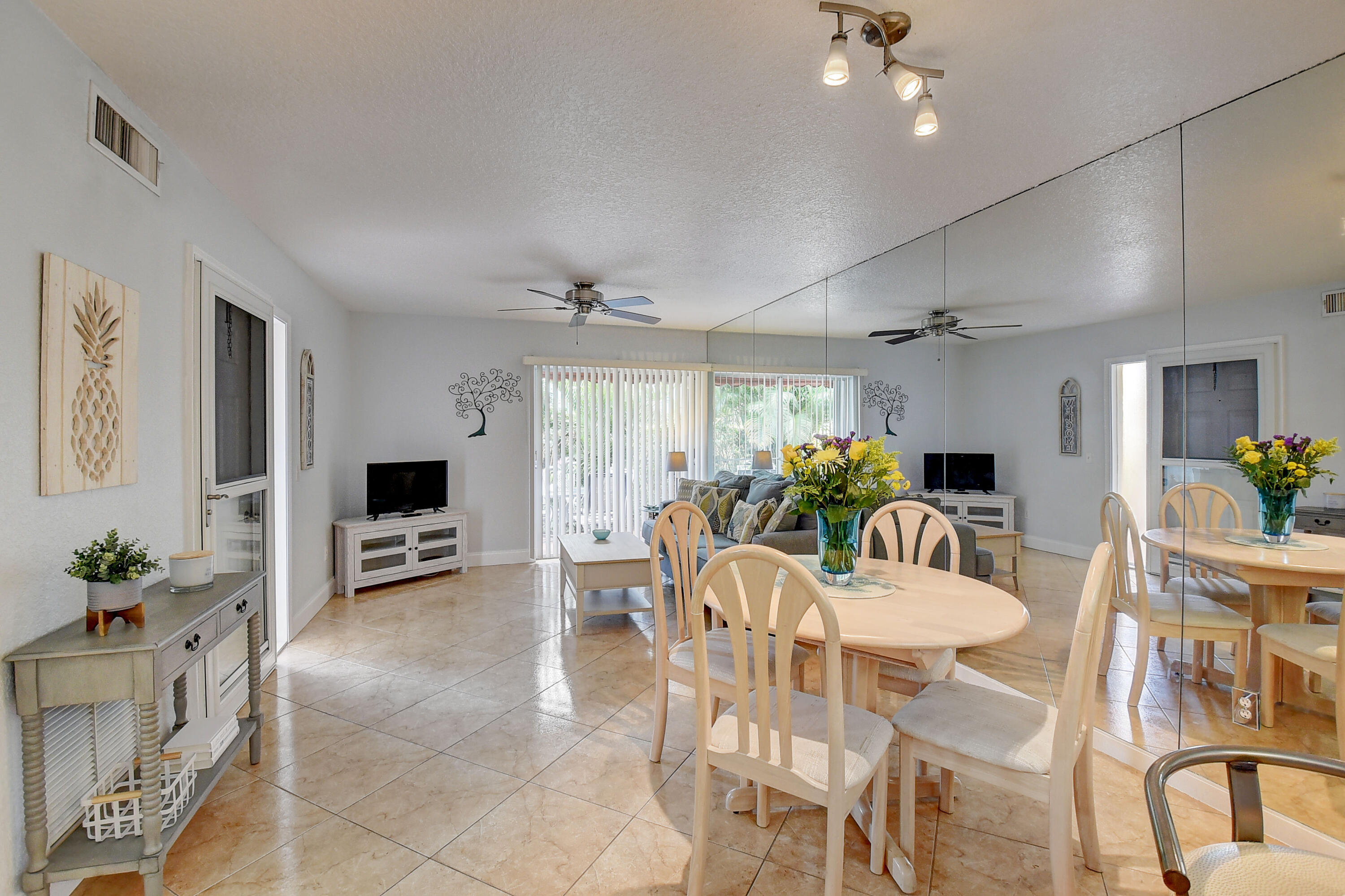 604 Waterside Drive, Unit 604 Hypoluxo, FL 33462 - Photo 8 of 21 DINING ROOM