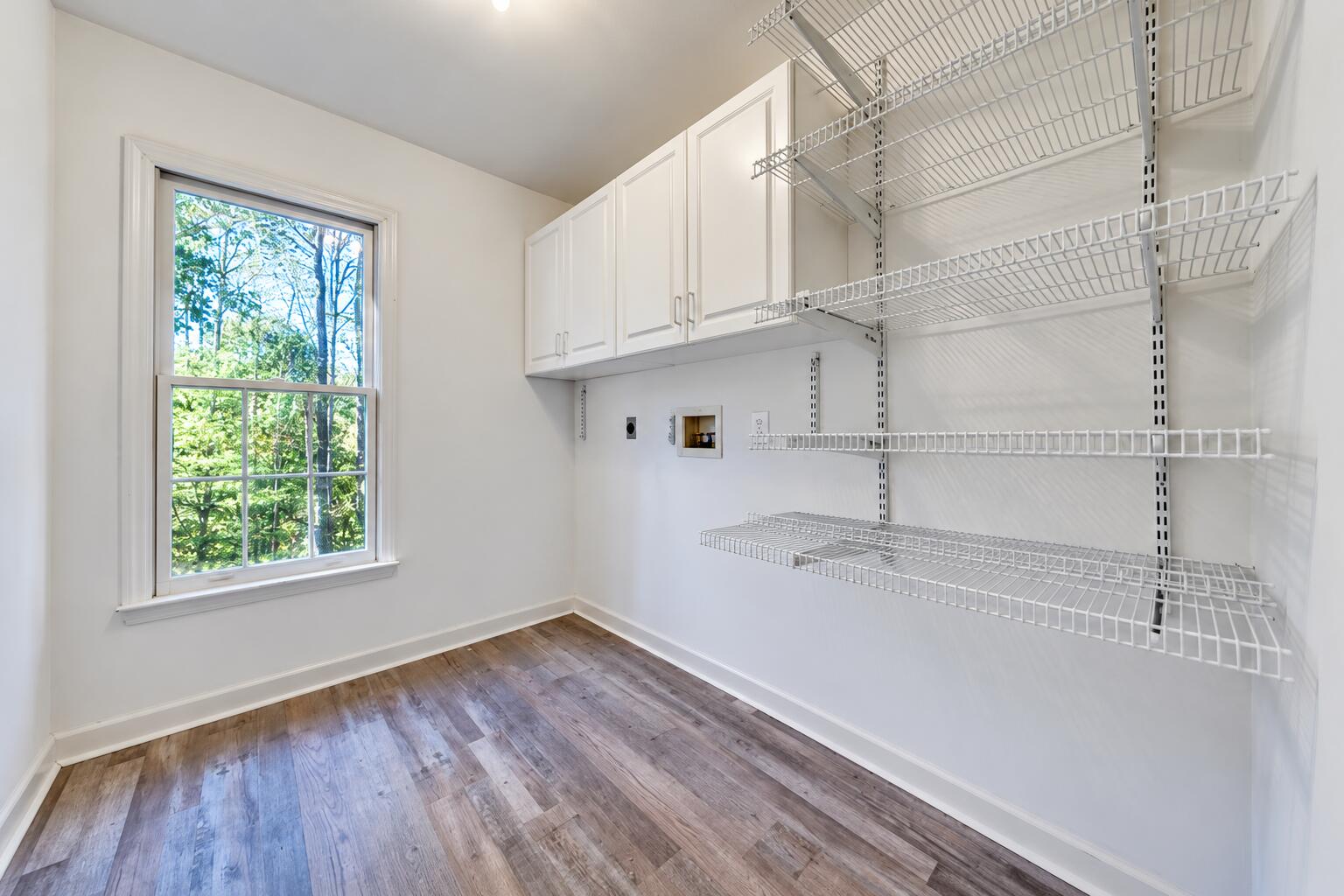 5539 Highfields Road Roanoke, VA 24018 - Photo 31 of 54 Bright Empty Laundry Room with Shelving