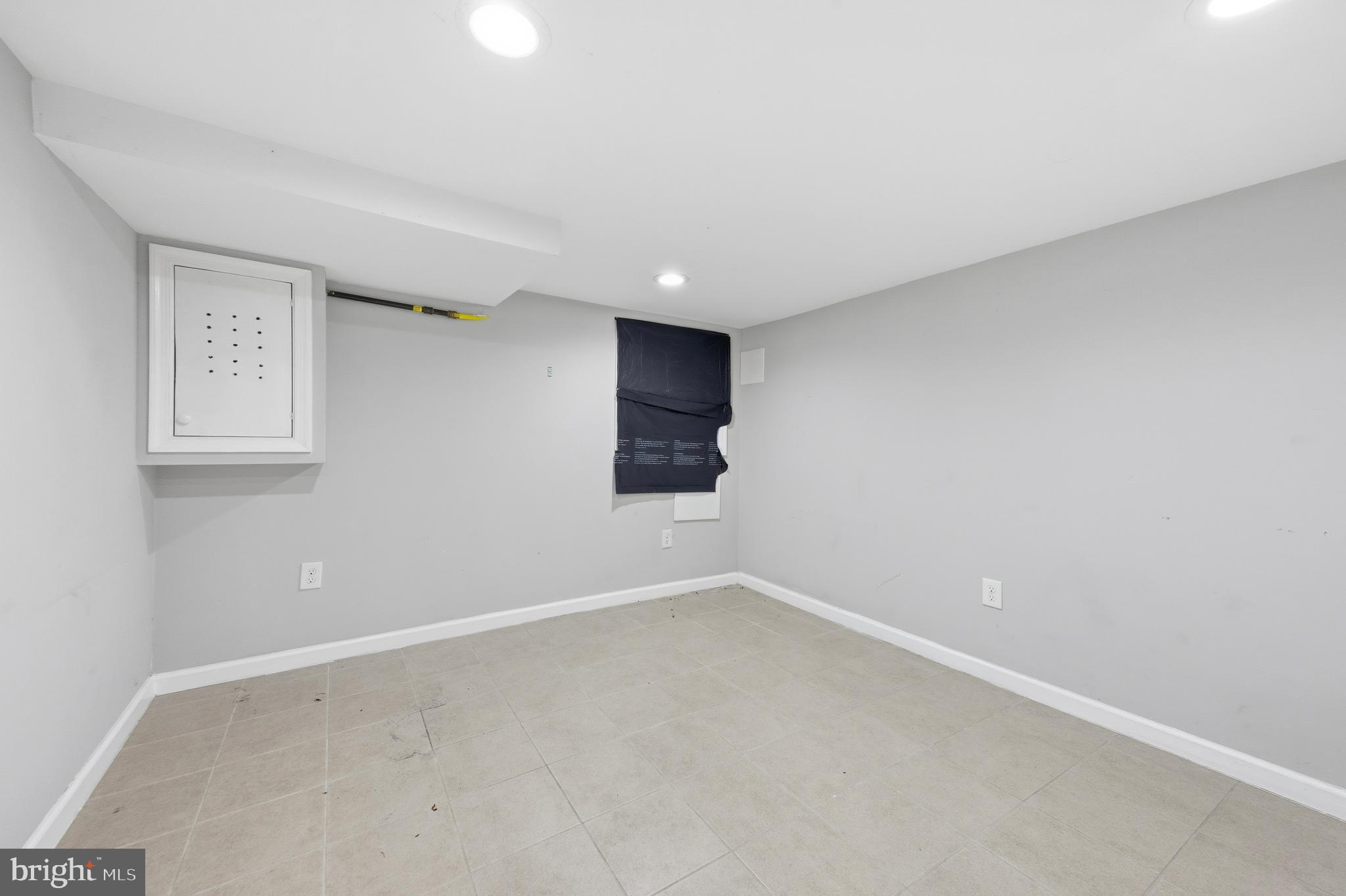 714 North Duncan Street Baltimore, MD 21205 - Photo 16 of 24 a view of an empty room with a window