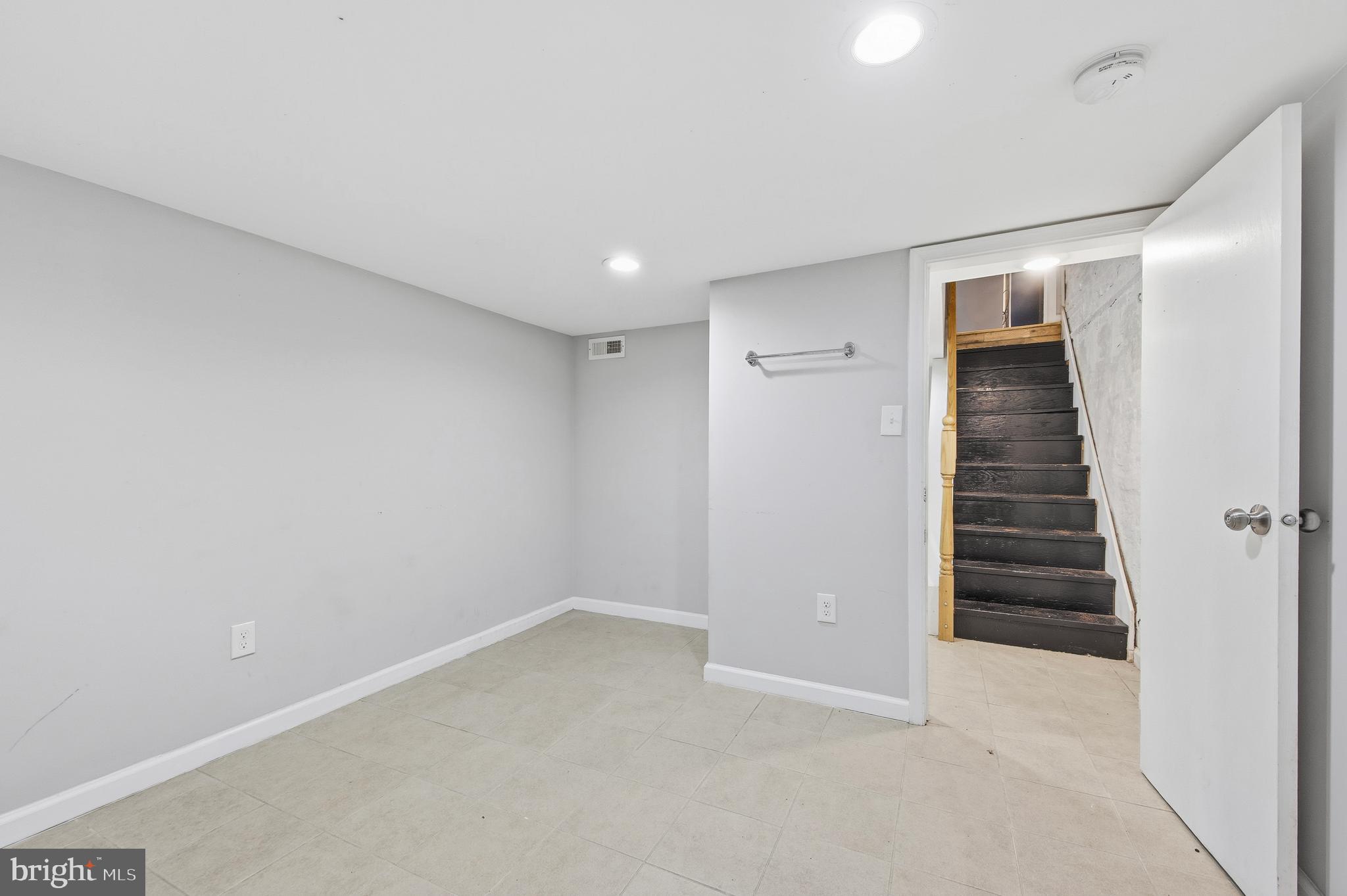 714 North Duncan Street Baltimore, MD 21205 - Photo 17 of 24 an empty room with a hallway