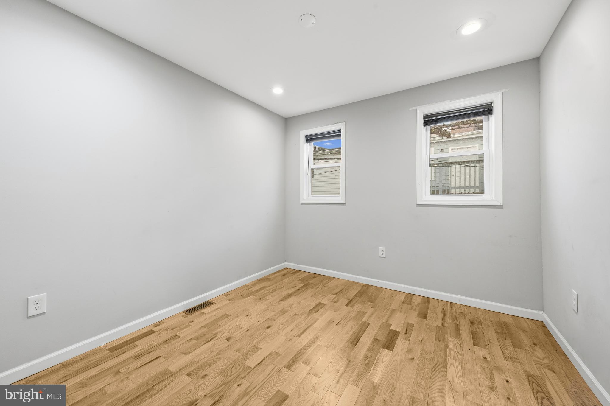 714 North Duncan Street Baltimore, MD 21205 - Photo 20 of 24 a view of empty room with wooden floor