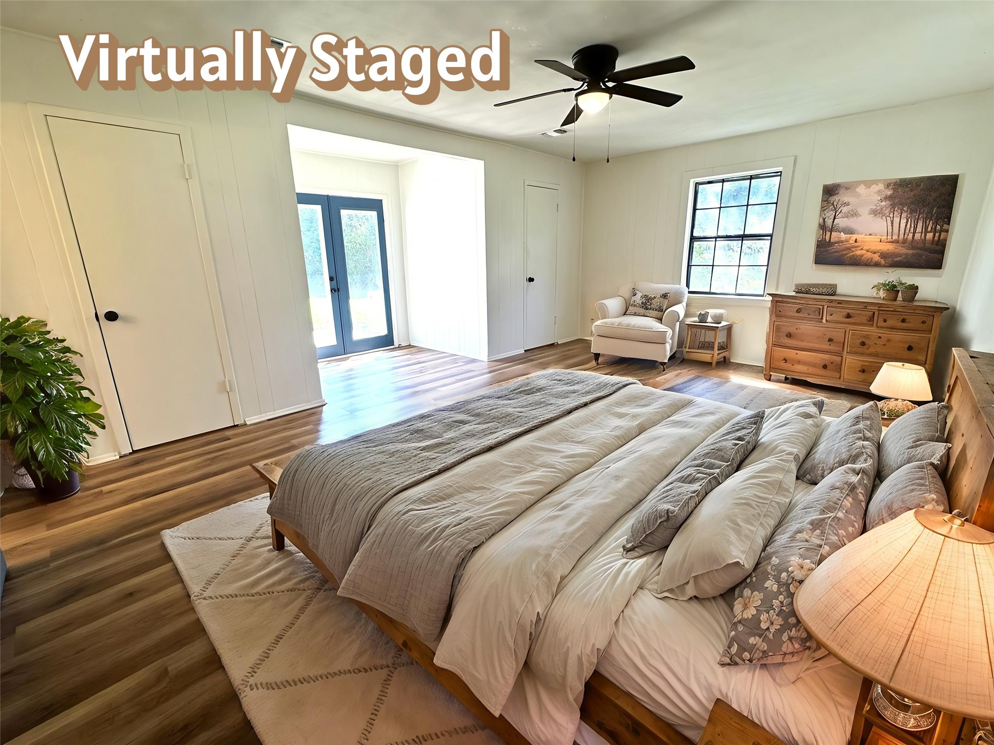 1207 Half Moon Drive Wharton, TX 77488 - Photo 35 of 50 a spacious bedroom with a bed and a flat screen tv