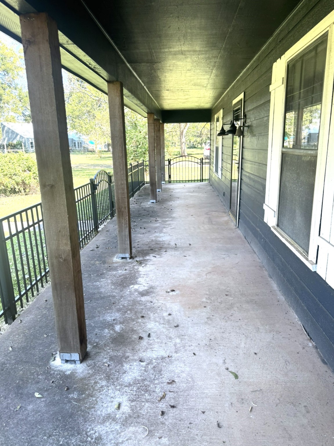 1207 Half Moon Drive Wharton, TX 77488 - Photo 43 of 50 a view of empty room with floor to ceiling windows