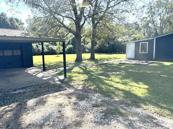 a sign broad on the side of the road