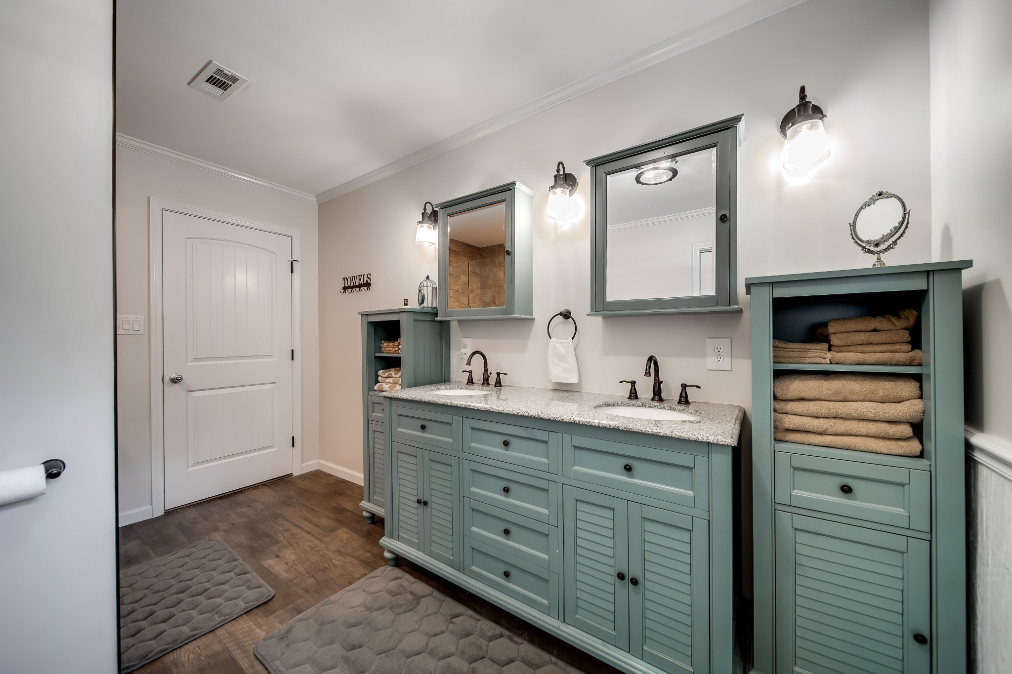554 Hickman Shores Road Dover, TN 37058 - Photo 37 of 93 a spacious bathroom with a granite countertop sink and a mirror