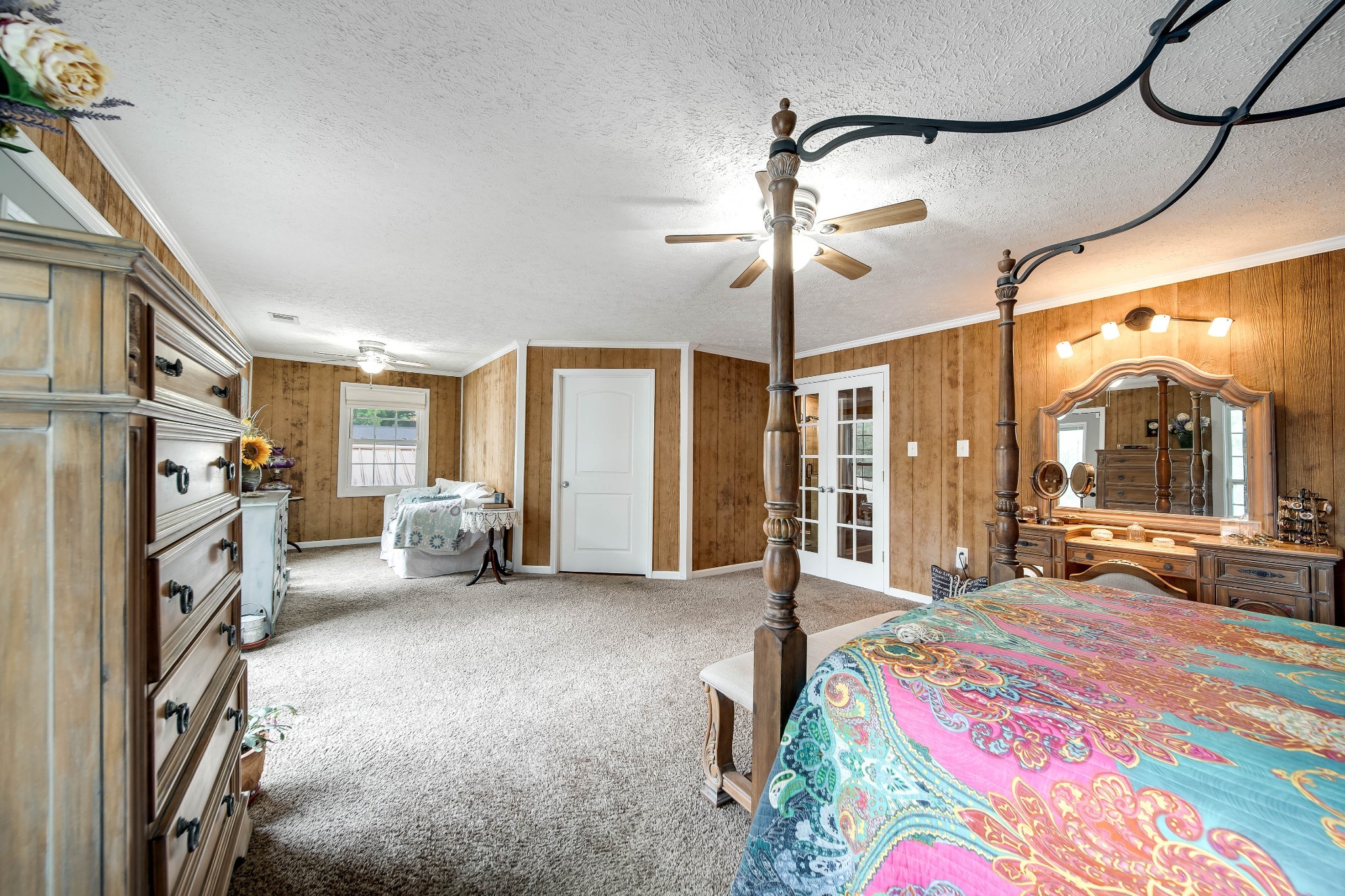 554 Hickman Shores Road Dover, TN 37058 - Photo 38 of 93 a spacious bedroom with a bed closet and a large window