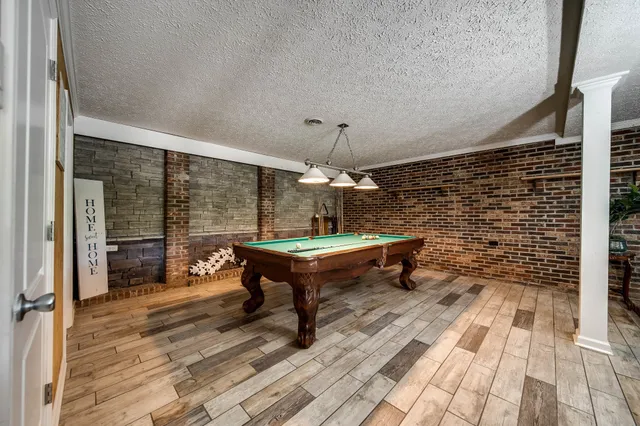 a view of a park with large trees