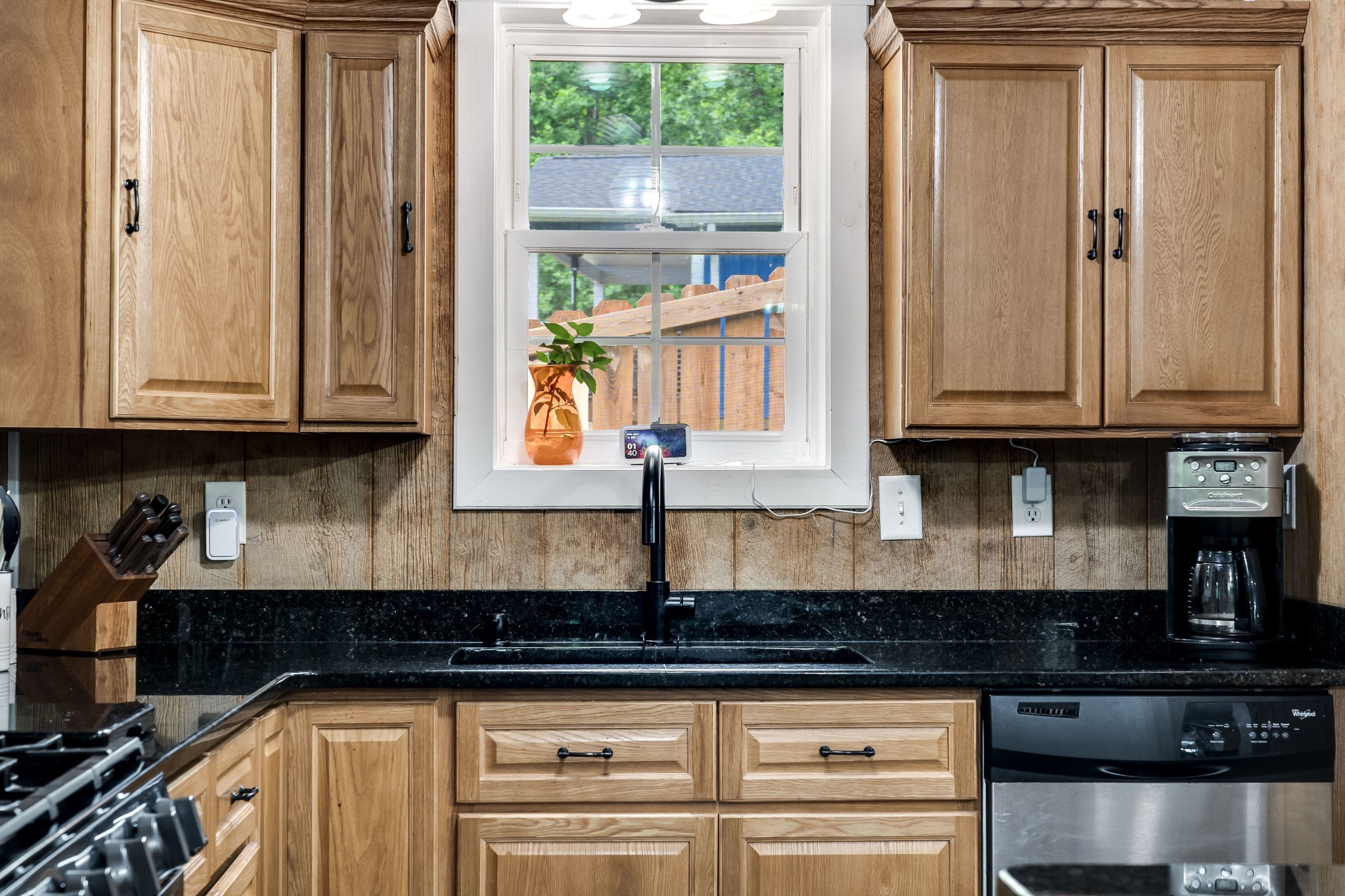554 Hickman Shores Road Dover, TN 37058 - Photo 59 of 93 a kitchen with stainless steel appliances granite countertop a sink a stove and a microwave