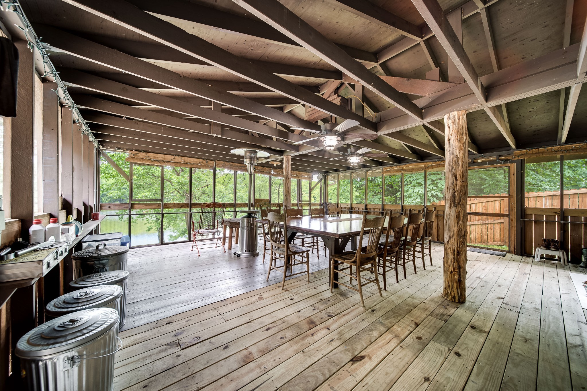 554 Hickman Shores Road Dover, TN 37058 - Photo 63 of 93 a view of a dining room with furniture window and wooden floor