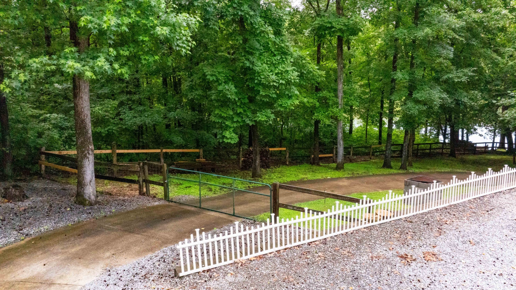 554 Hickman Shores Road Dover, TN 37058 - Photo 78 of 93 a view of a backyard with wooden fence