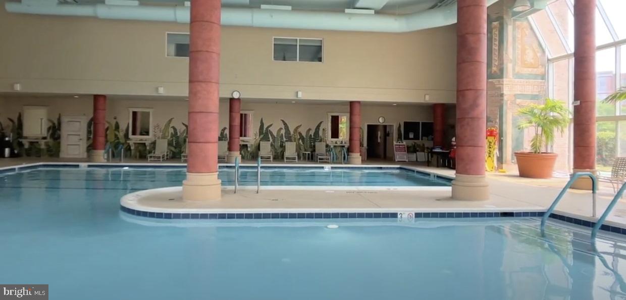 19385 Cypress Ridge Terrace, Unit 920 Leesburg, VA 20176 - Photo 33 of 40 Relax and swim in the indoor pool.