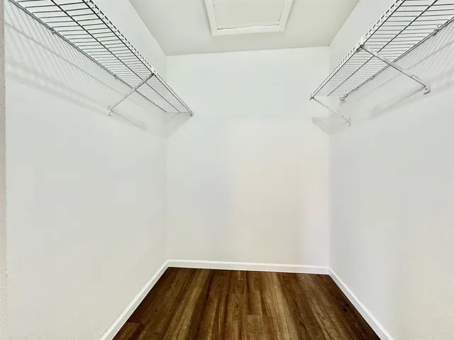 a view of a room with racks on the wall