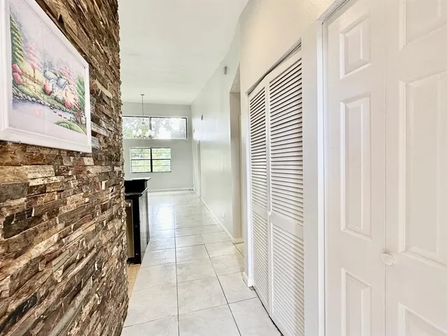 a bathroom with a shower and a door