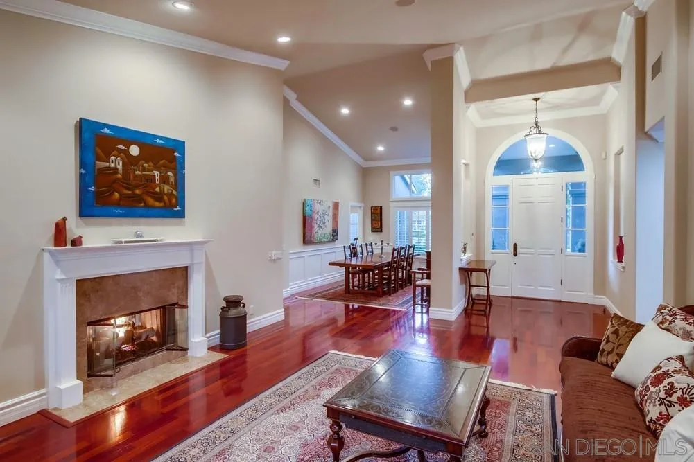 14476 Trailwind Road Poway, CA 92064 - Photo 18 of 61 a living room with furniture and a fireplace