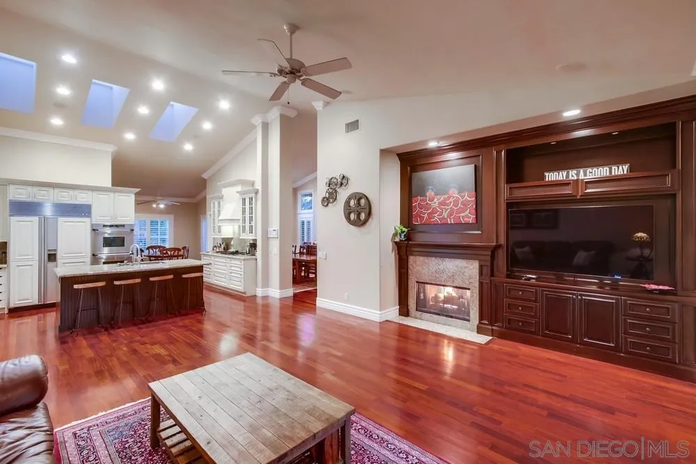 14476 Trailwind Road Poway, CA 92064 - Photo 24 of 61 a living room with furniture and a flat screen tv