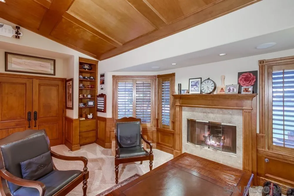14476 Trailwind Road Poway, CA 92064 - Photo 26 of 61 a living room with furniture a window and a fireplace