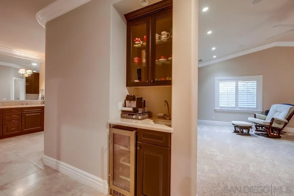 14476 Trailwind Road Poway, CA 92064 - Photo 30 of 61 a view of a hallway with a livingroom and a window