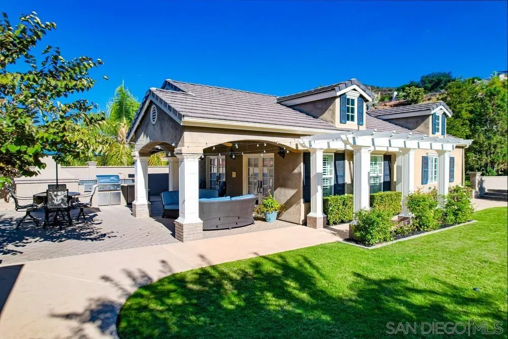 14476 Trailwind Road Poway, CA 92064 - Photo 36 of 61 a view of a house with backyard and porch