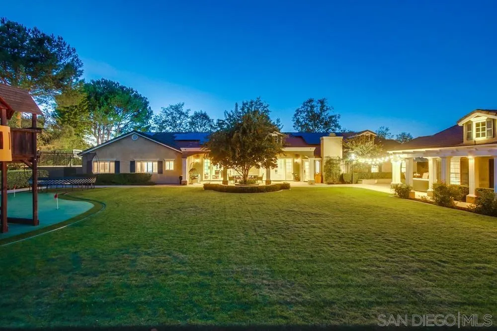 14476 Trailwind Road Poway, CA 92064 - Photo 4 of 61 a front view of a house with a yard