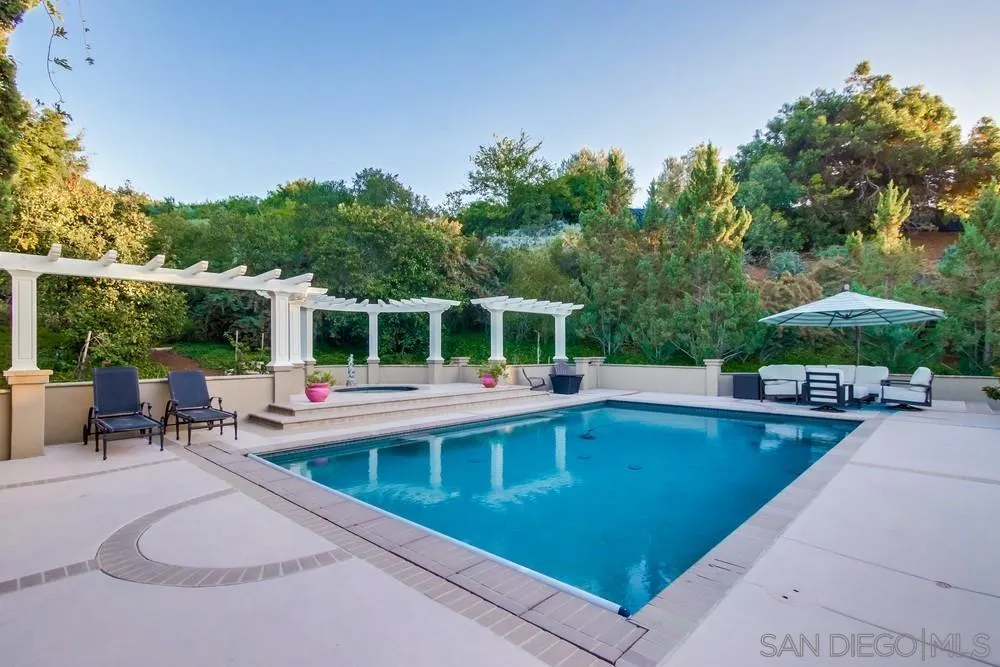 14476 Trailwind Road Poway, CA 92064 - Photo 50 of 61 a view of a house with swimming pool and sitting area