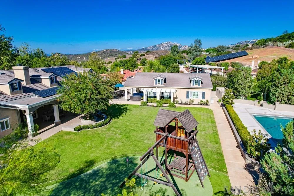 14476 Trailwind Road Poway, CA 92064 - Photo 56 of 61 a view of a house with a big yard