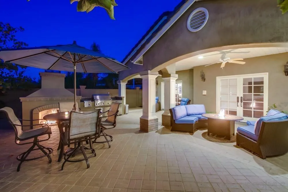 14476 Trailwind Road Poway, CA 92064 - Photo 10 of 61 a view of a dining room with furniture and chandelier