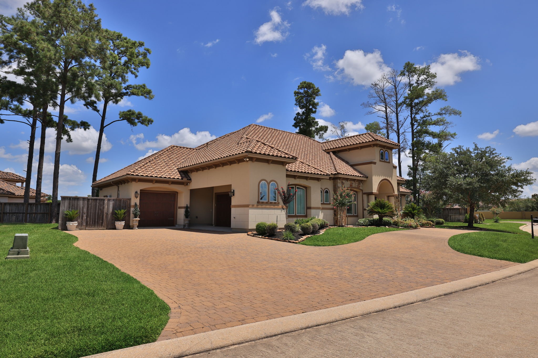 58 Shadow Creek Ridge Drive Spring, TX 77389 - Photo 4 of 49 Side view of 3 car garages, brick driveway and extra parking