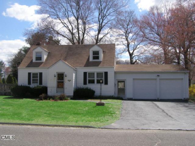21 Meadow Road Trumbull, CT 06611 - Photo 1 of 1 a front view of house with yard and green space