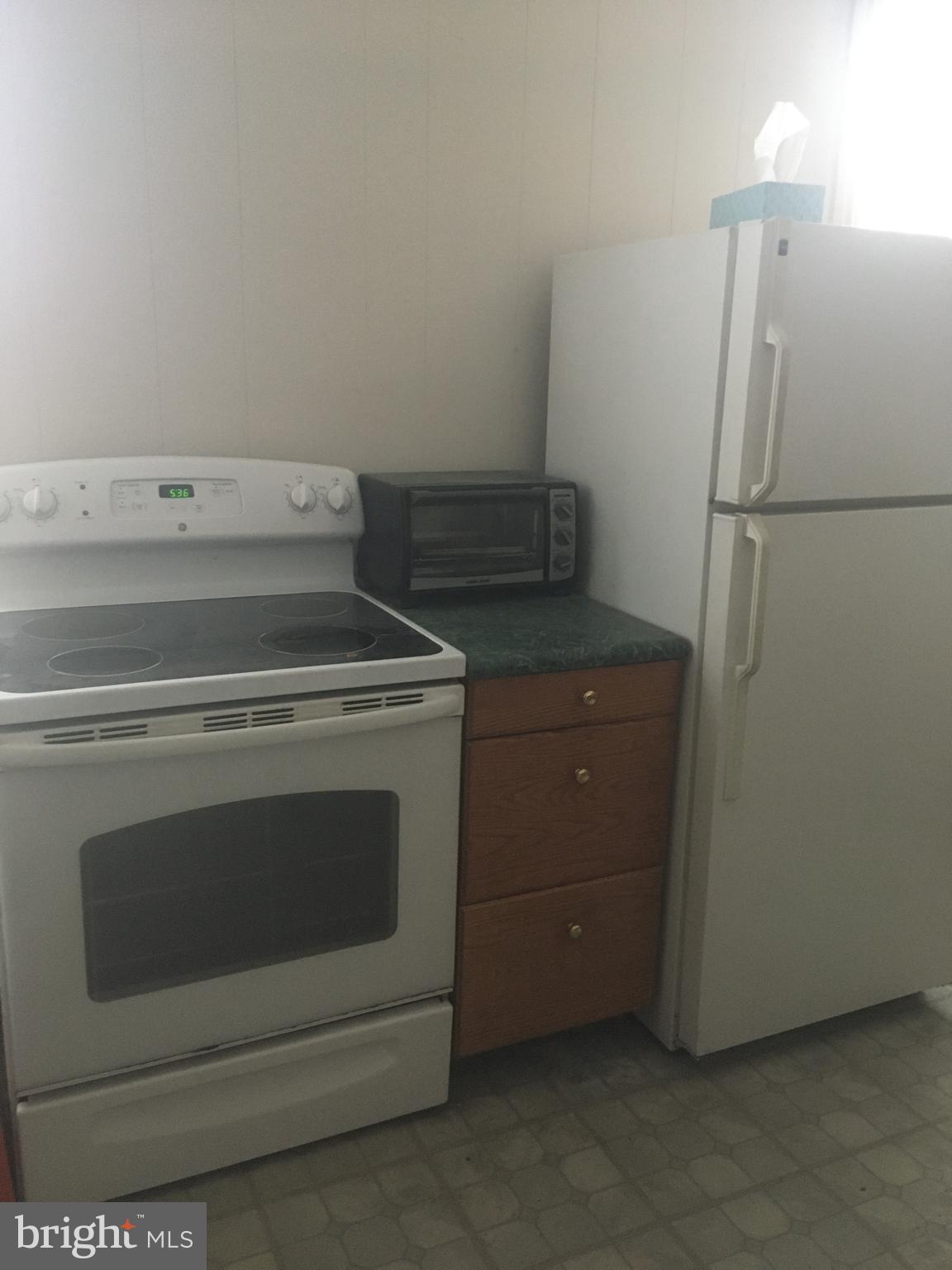 240 Rexmont Road Lebanon, PA 17042 - Photo 9 of 17 Kitchen range, work space, & refrigerator