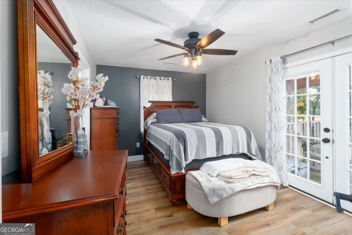 161 Archer Grove Road Athens, GA 30607 - Photo 16 of 56 a bedroom with furniture and a window