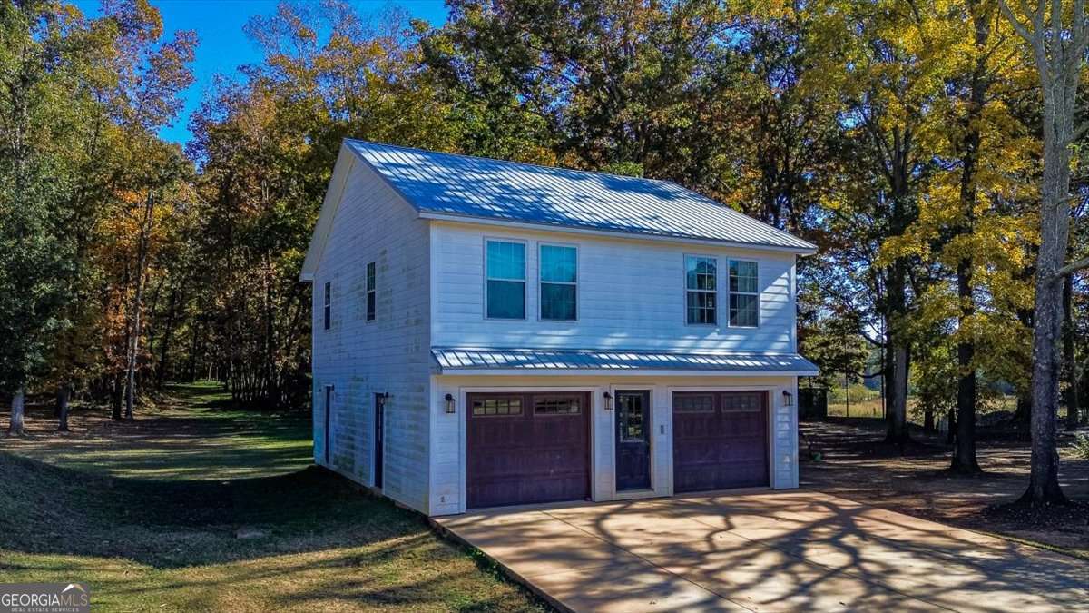 161 Archer Grove Road Athens, GA 30607 - Photo 2 of 56 a view of a house with a yard