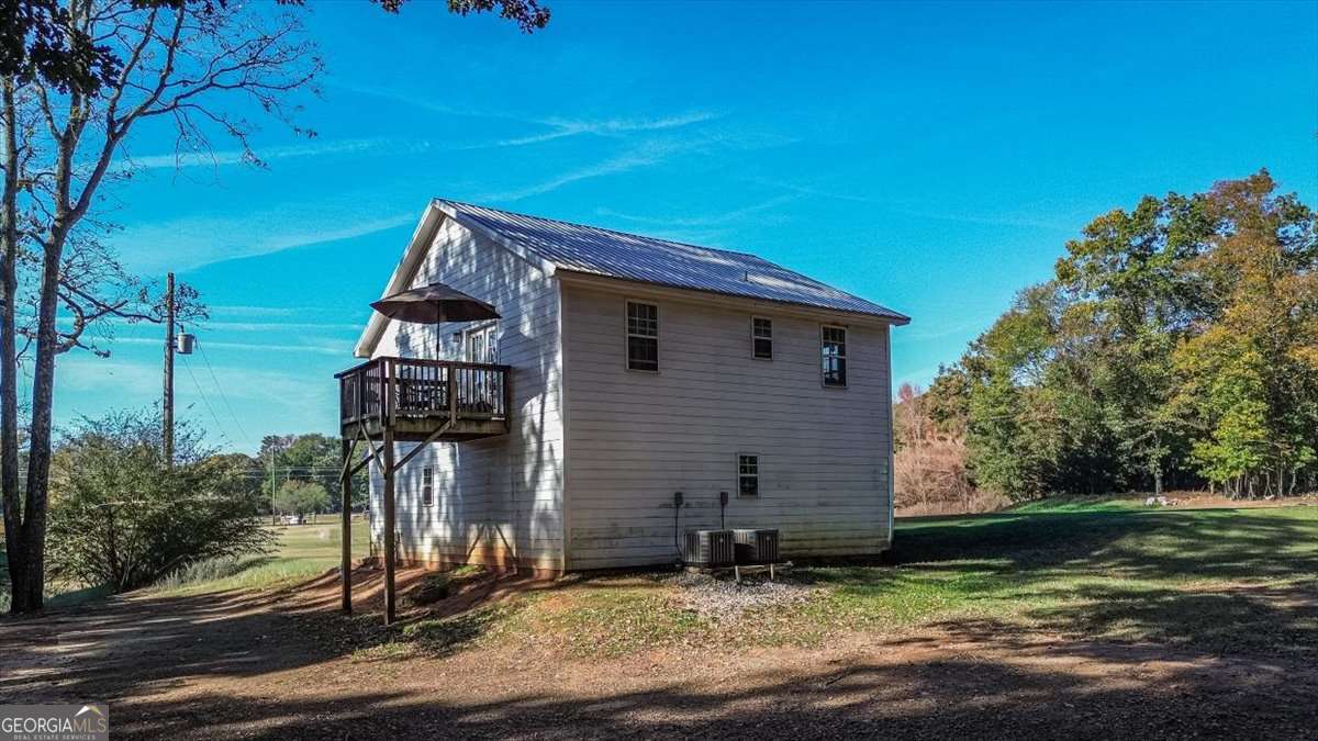 161 Archer Grove Road Athens, GA 30607 - Photo 3 of 56 a backyard of a house with lots of green space