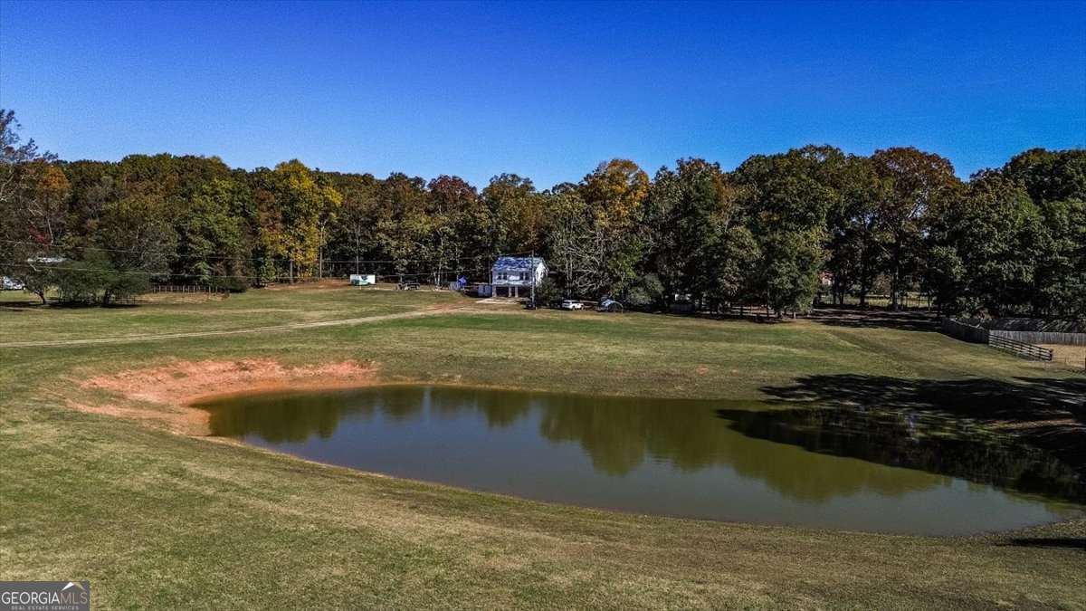 161 Archer Grove Road Athens, GA 30607 - Photo 44 of 56 a view of a lake from a yard