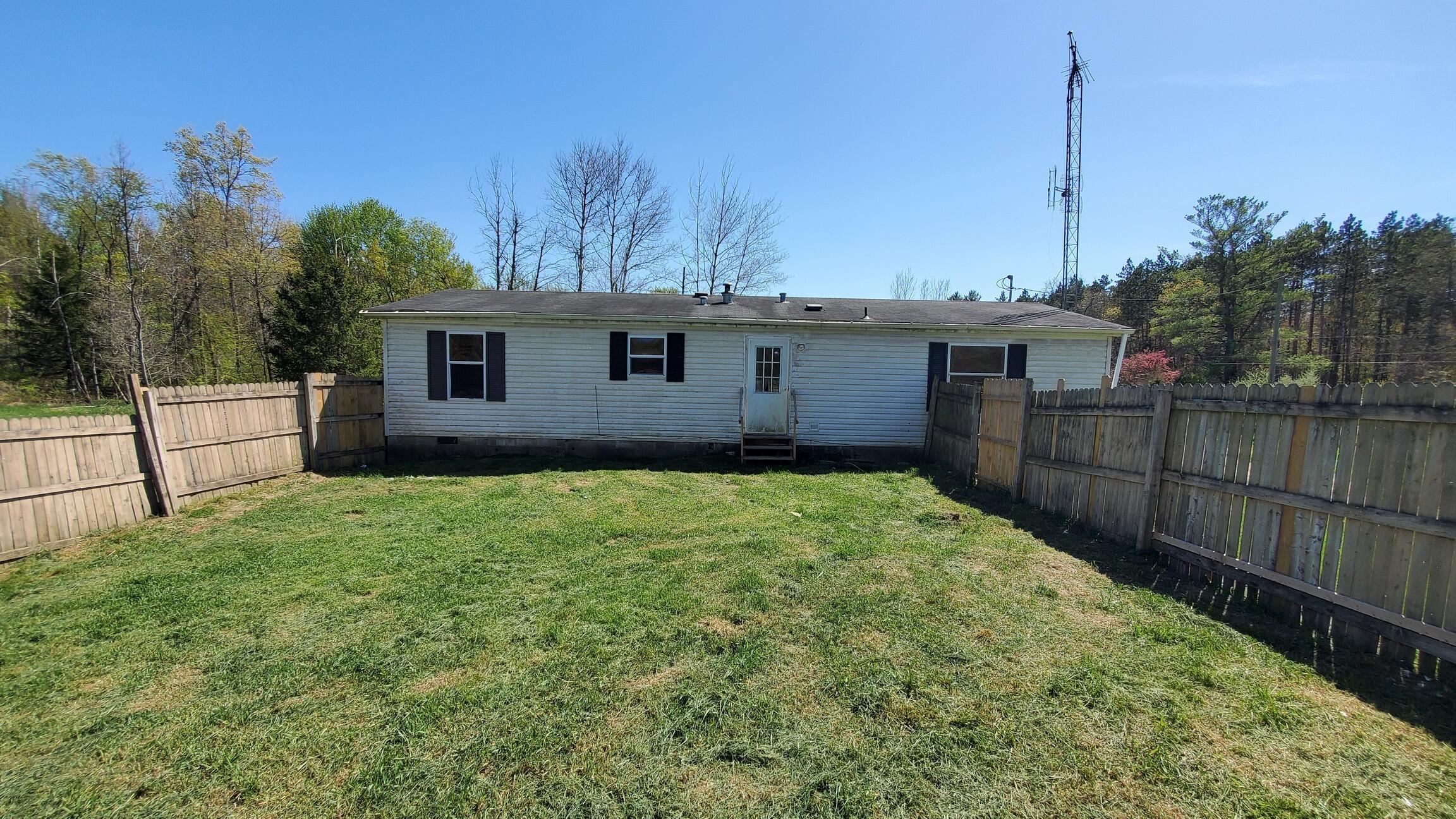 7939 East Moore Road Ravenna, MI 49451 - Photo 6 of 13 BACK