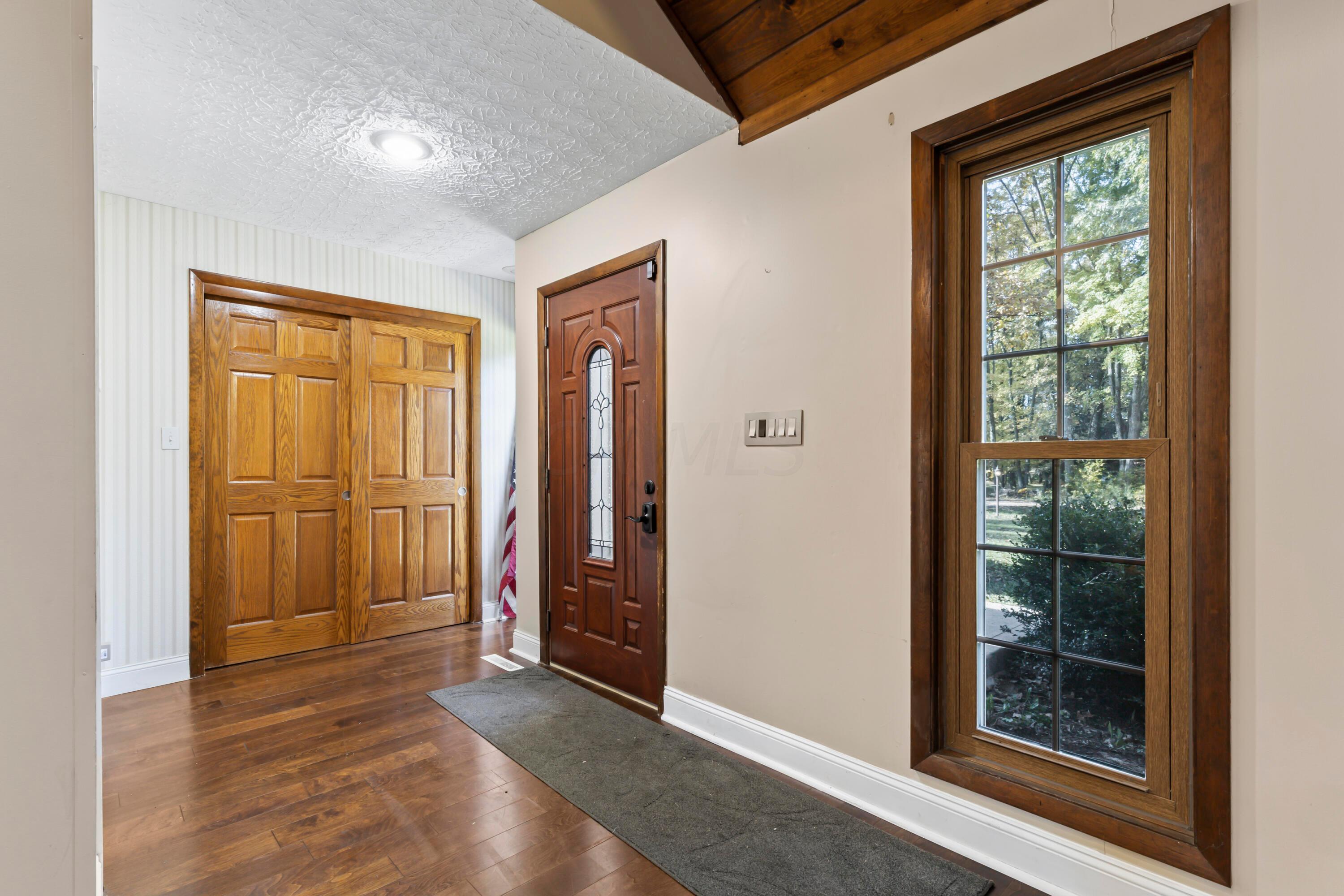 9495 Kilbourne Road Sunbury, OH 43074 - Photo 3 of 84 • New engineered hardwood
flooring May 2017
• Tan painted & striped papered
walls
• Can lighting
• Closet with double sliding
doors