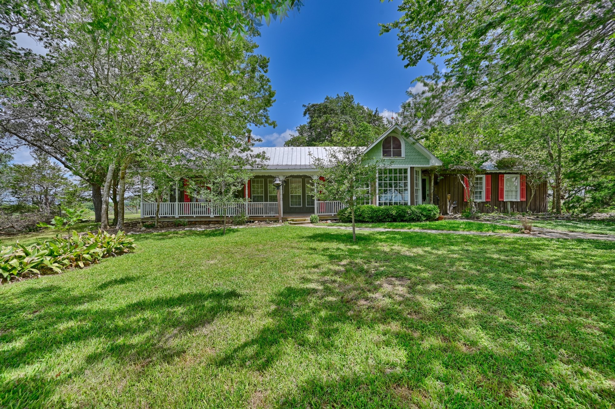 5208 Mensik Road Schulenburg, TX 78956 - Photo 10 of 18 a front view of a house with garden