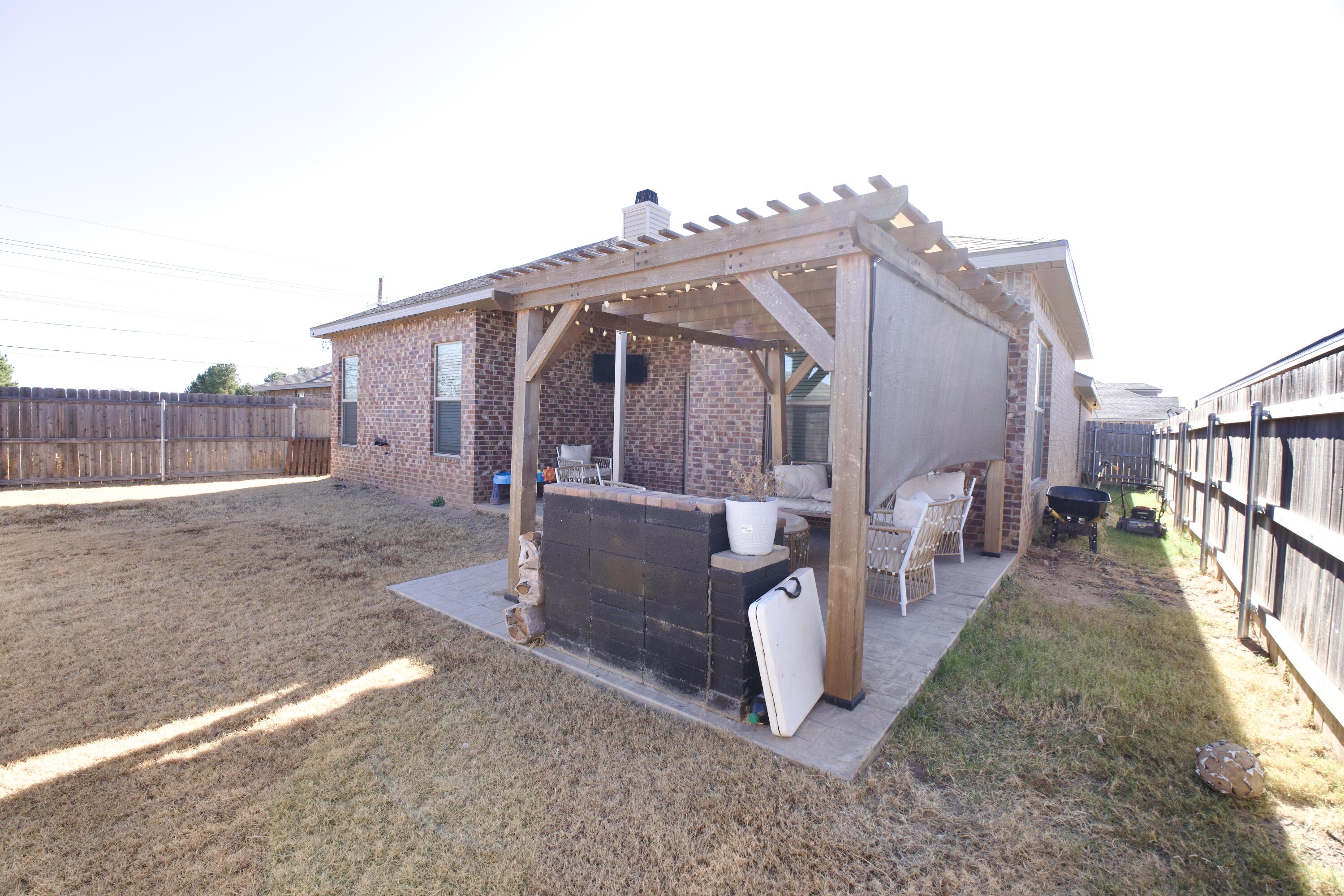 1604 137th Street Lubbock, TX 79423 - Photo 19 of 19 a view of a house with backyard and deck