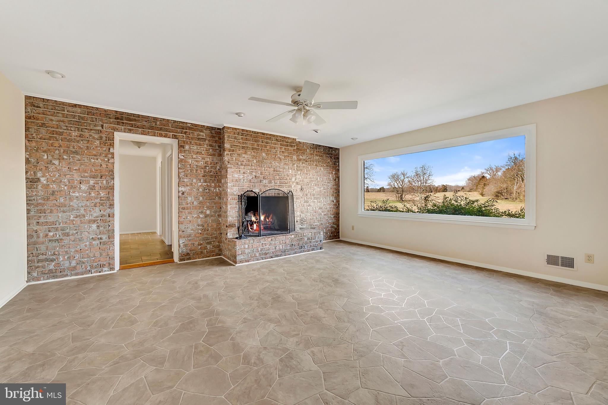 9861 Meetze Road Midland, VA 22728 - Photo 24 of 50 Family room with fireplace