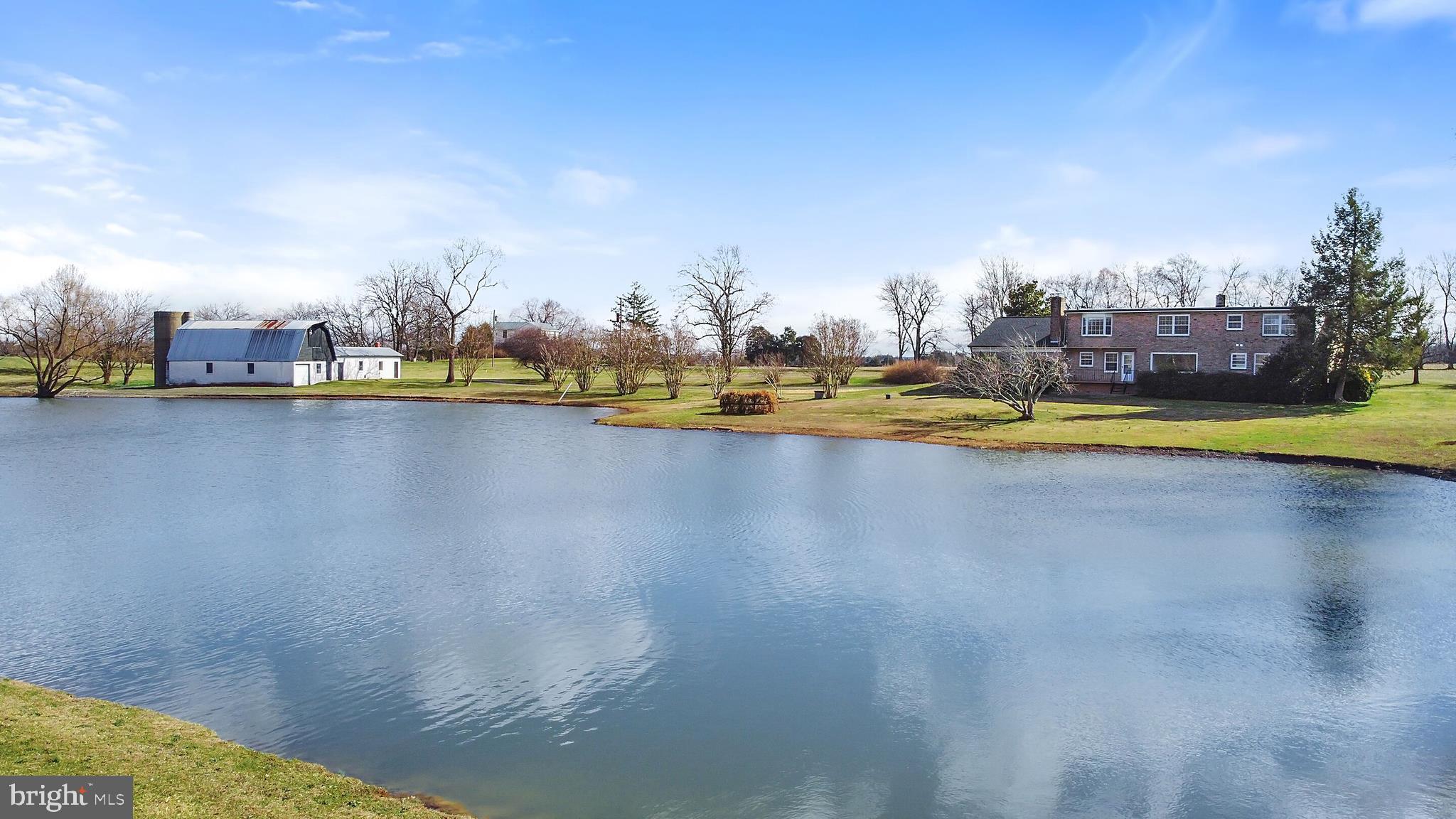 9861 Meetze Road Midland, VA 22728 - Photo 8 of 50 Brick rambler rear view from across lake