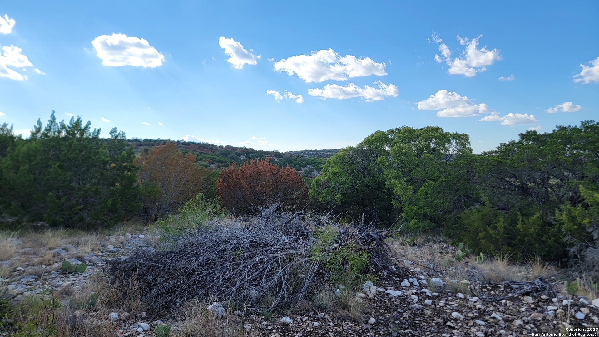 29 Oak Bend Rocksprings, TX 78880 - Photo 13 of 27 a view of a house with a yard