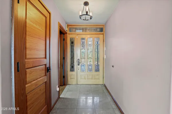a view of a hallway with windows