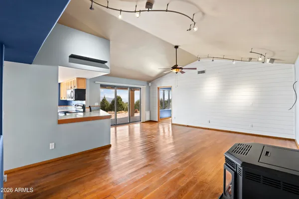 a view of a livingroom with wooden floor