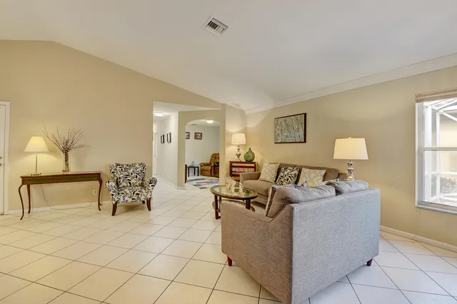 a kitchen with cabinets stainless steel appliances and a counter space
