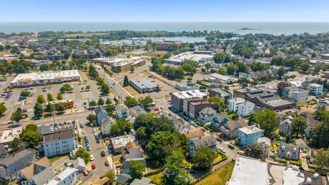 a car parked in front of a brick building
