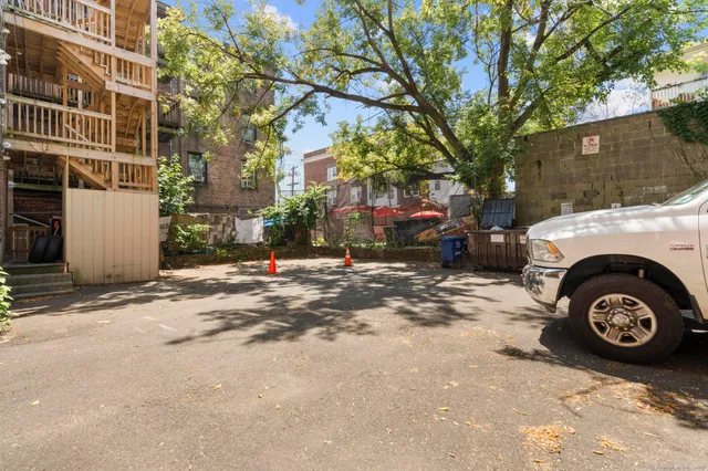 a front view of a building with street view